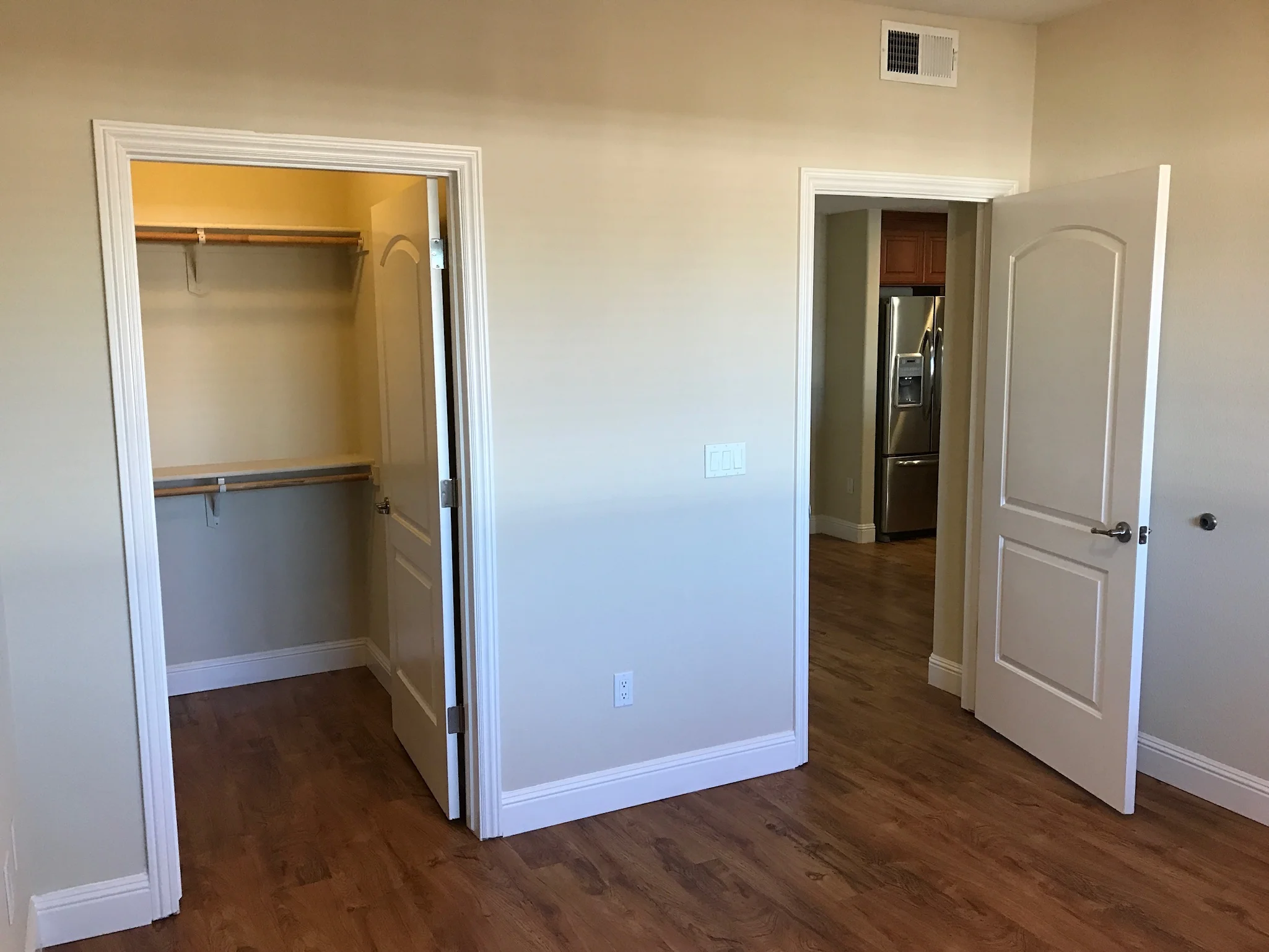 Bedroom with walk-in closet