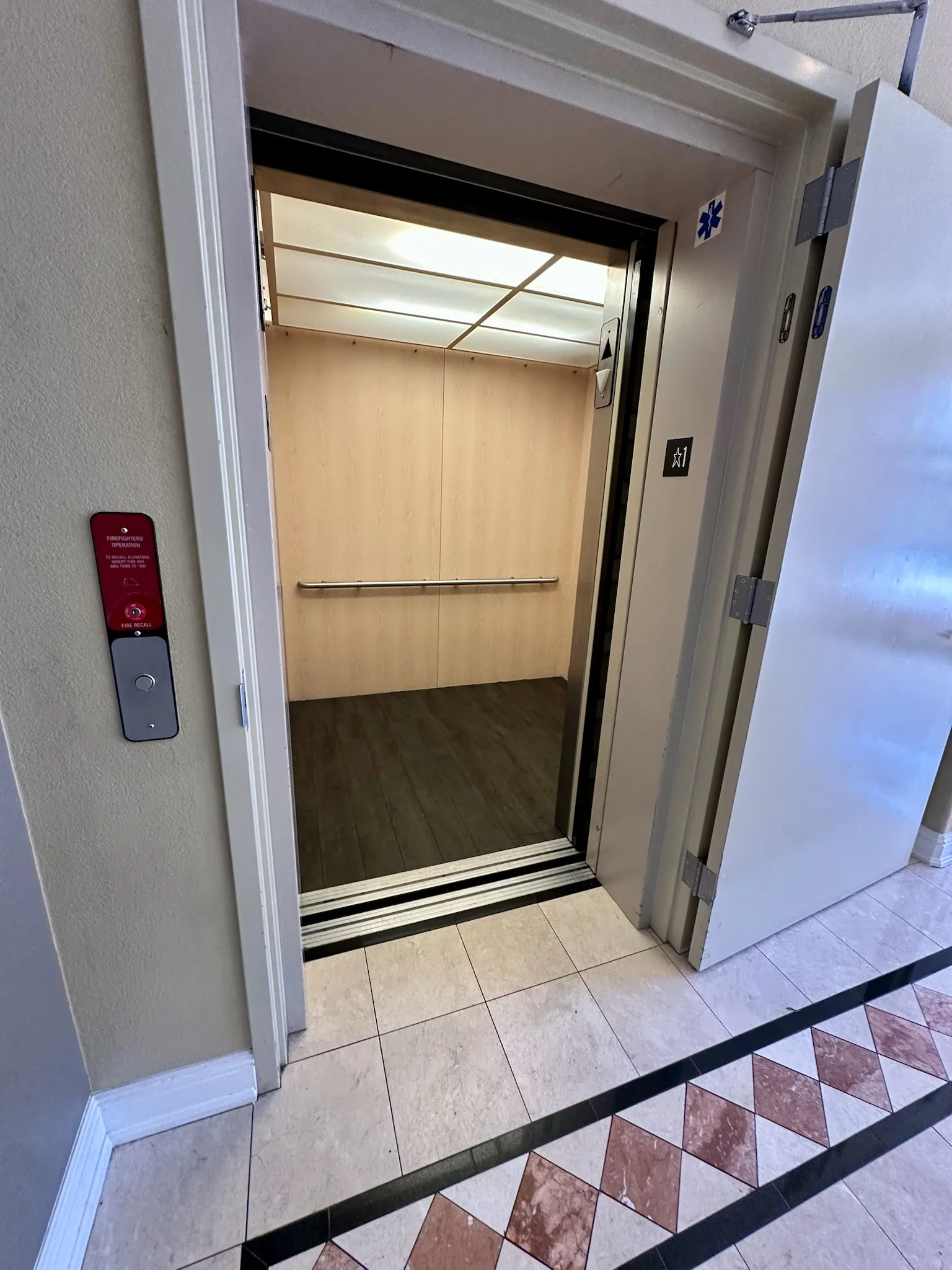 Accessible elevator interior at Monterey Terrace luxury apartments in downtown Gilroy