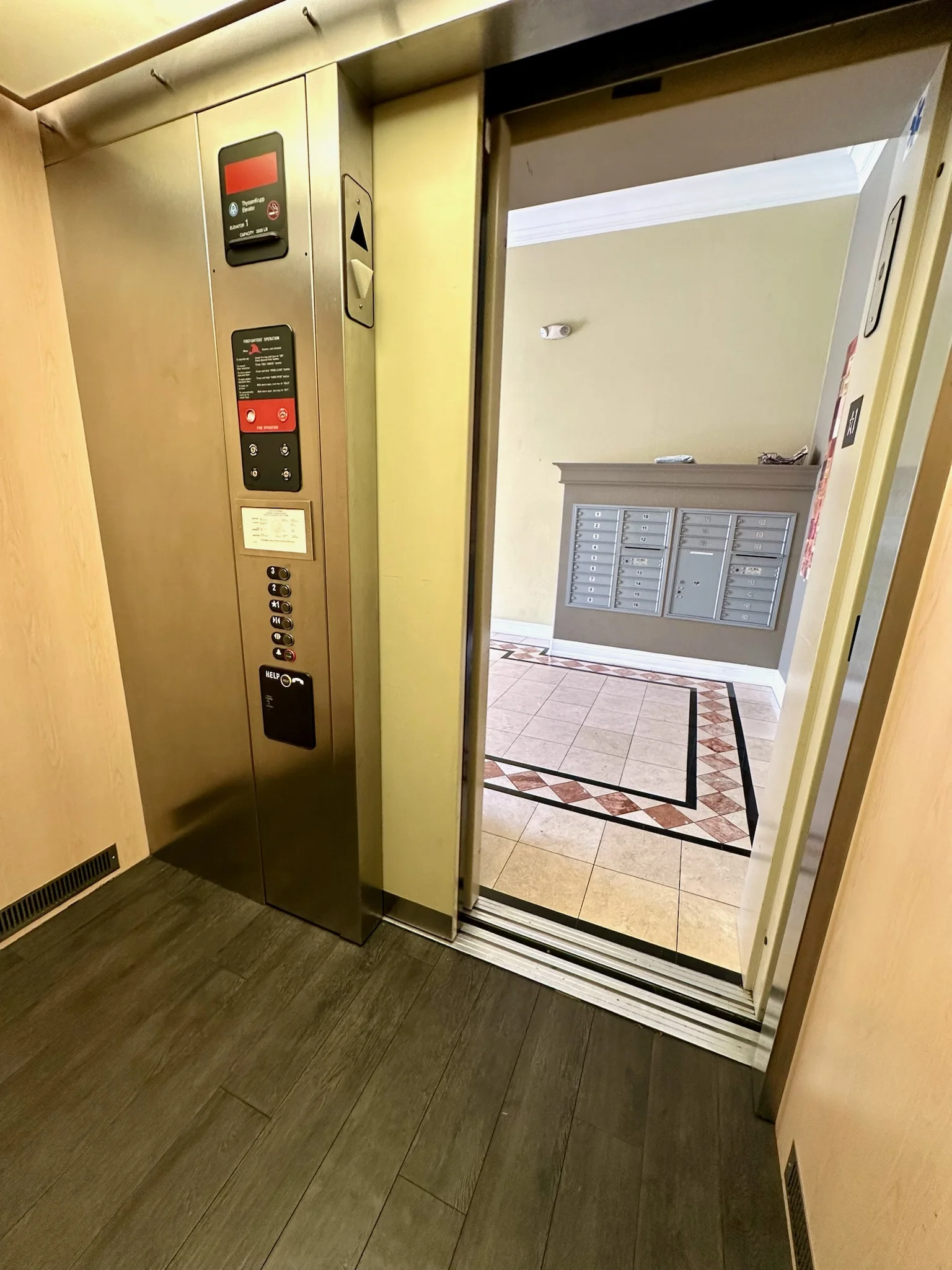 Elevator and mailboxes in the lobby at Monterey Terrace Apartments Gilroy CA