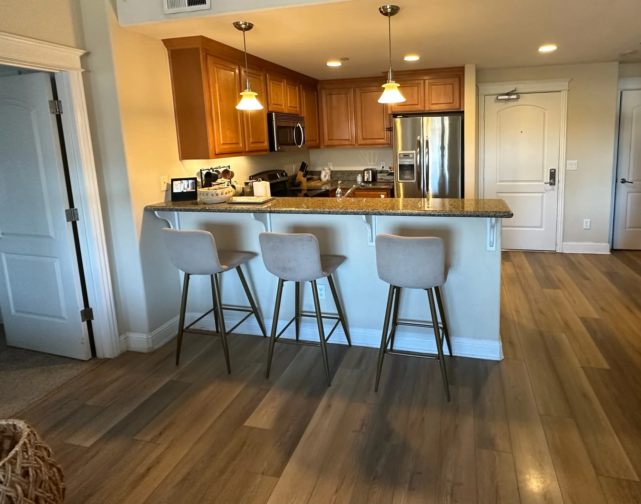 Kitchen breakfast bar with seating in Monterey Terrace apartment Gilroy CA