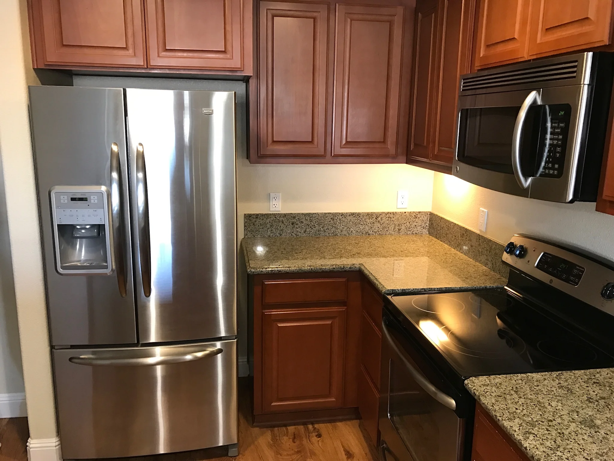 Stainless steel appliances and granite counters